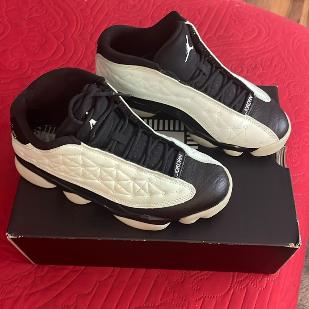 The Air Jordan 13 Low Singles' Day (2021) Glow in the dark.